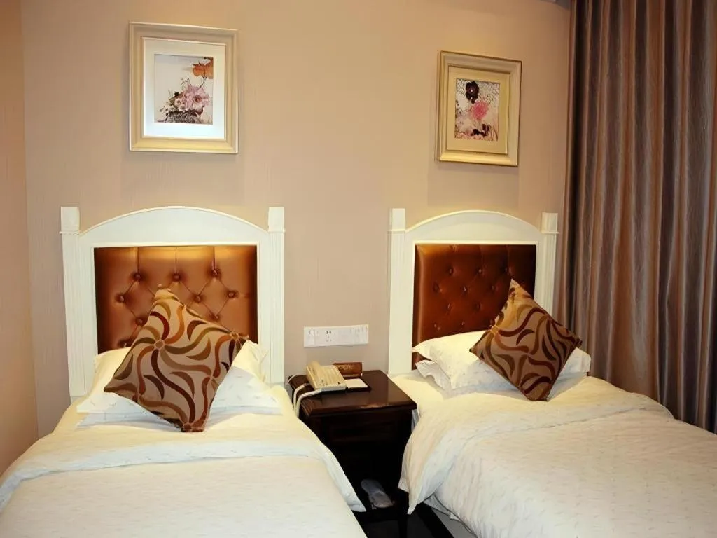 Bed in Hangzhou Silver Star Hotel