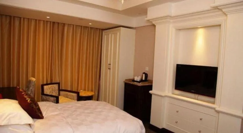 Bed in Hangzhou Silver Star Hotel