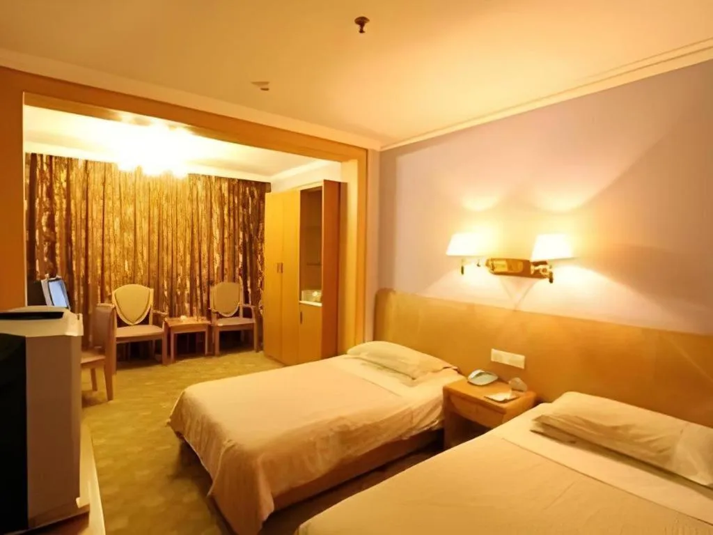 Bed in Hangzhou Silver Star Hotel