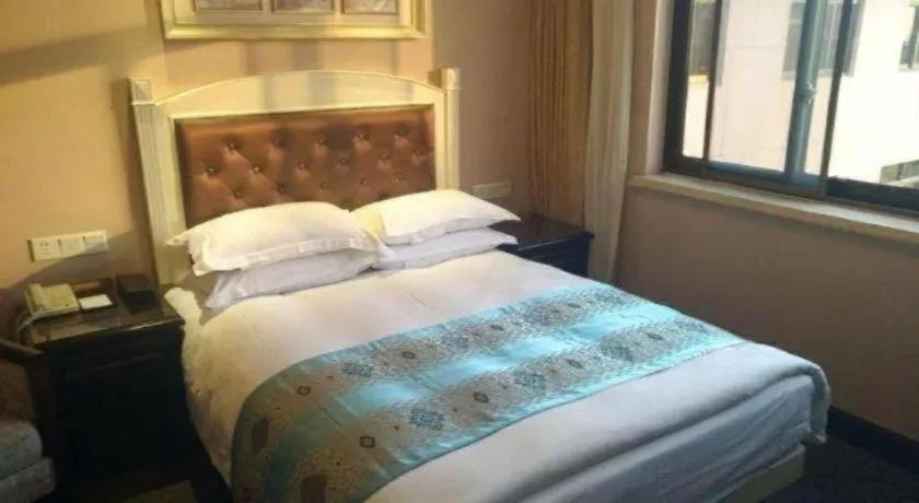 Bed in Hangzhou Silver Star Hotel