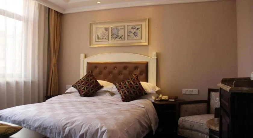 Bed in Hangzhou Silver Star Hotel