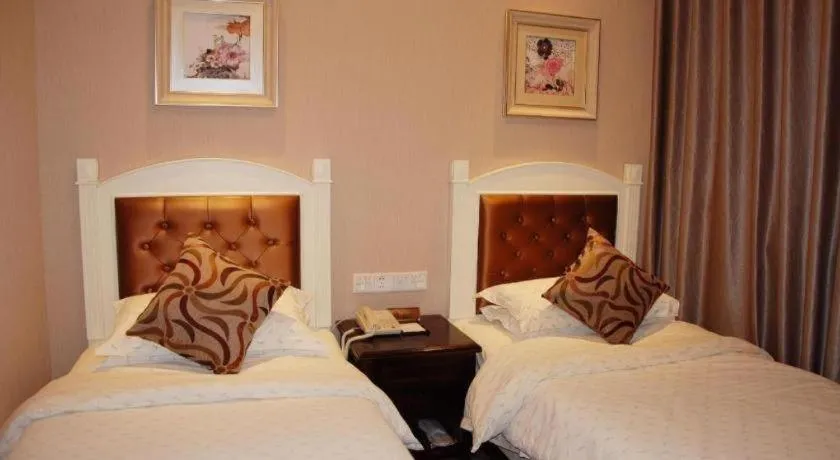 Bed in Hangzhou Silver Star Hotel