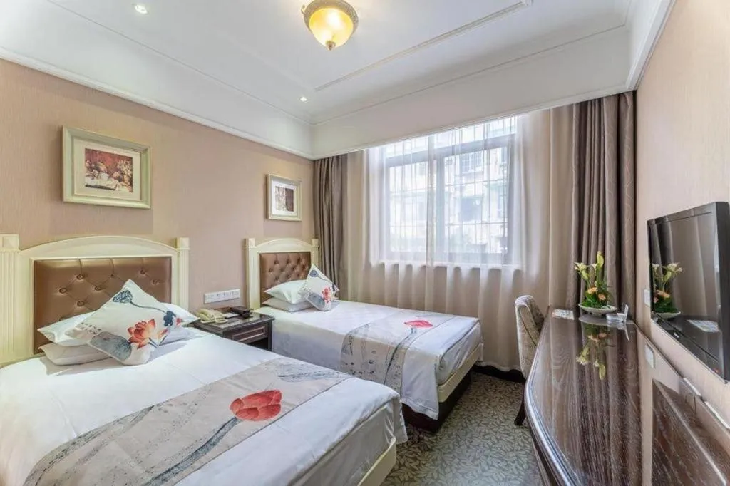 Bed in Hangzhou Silver Star Hotel