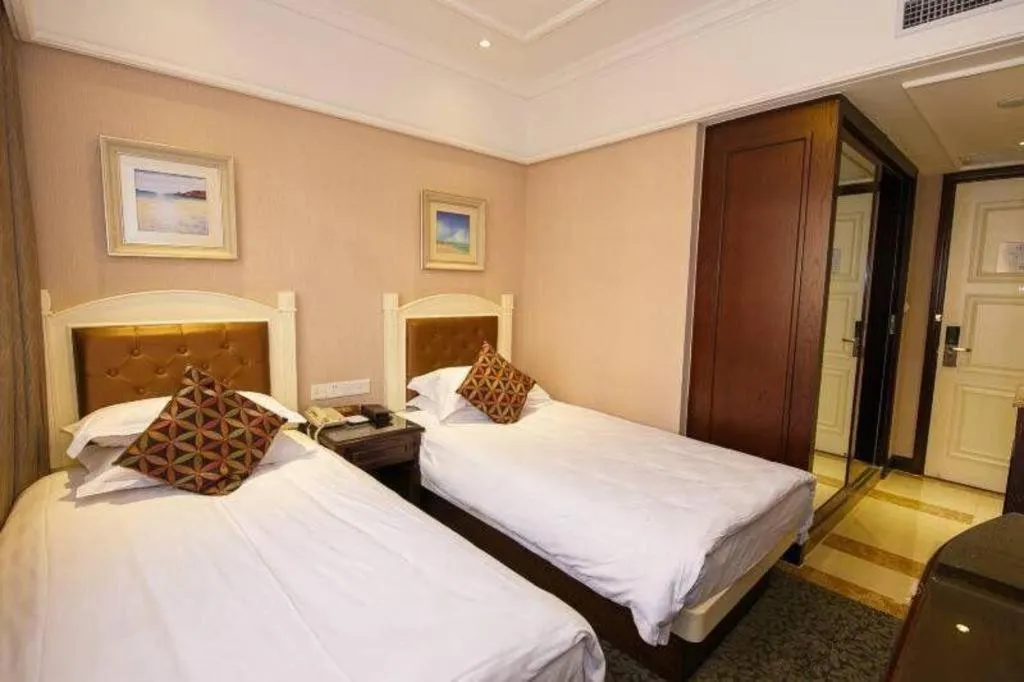Bed in Hangzhou Silver Star Hotel