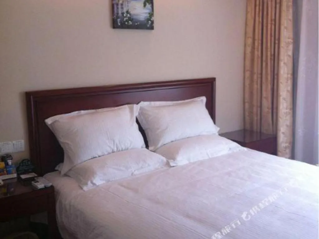 Bed in GreenTree Alliance Changzhou University City Hotel