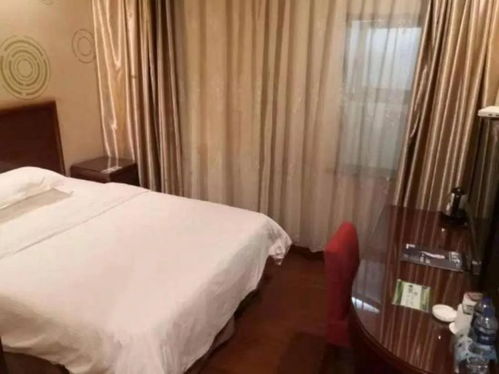 Bed in GreenTree Alliance Changzhou University City Hotel