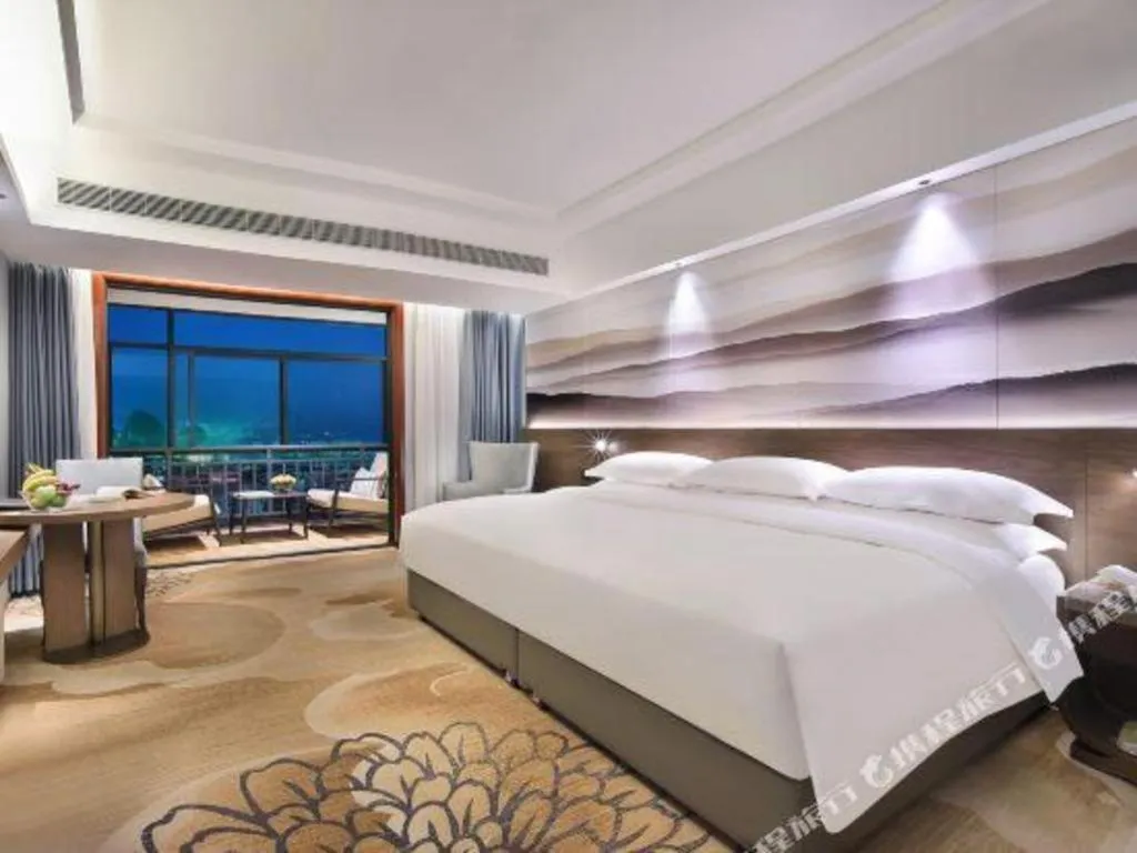 Bed in Vienna Hotel Guangxi Guilin 7-Star Wanda Plaza