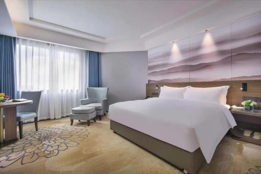 Bed in Vienna Hotel Guangxi Guilin 7-Star Wanda Plaza