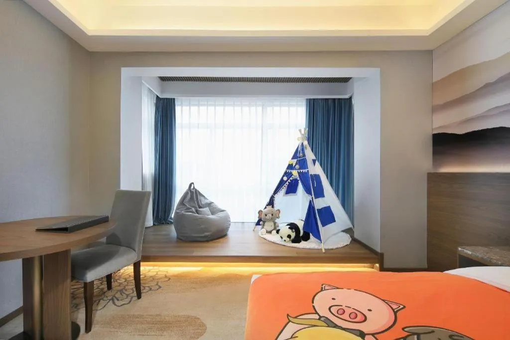 Bed in Vienna Hotel Guangxi Guilin 7-Star Wanda Plaza