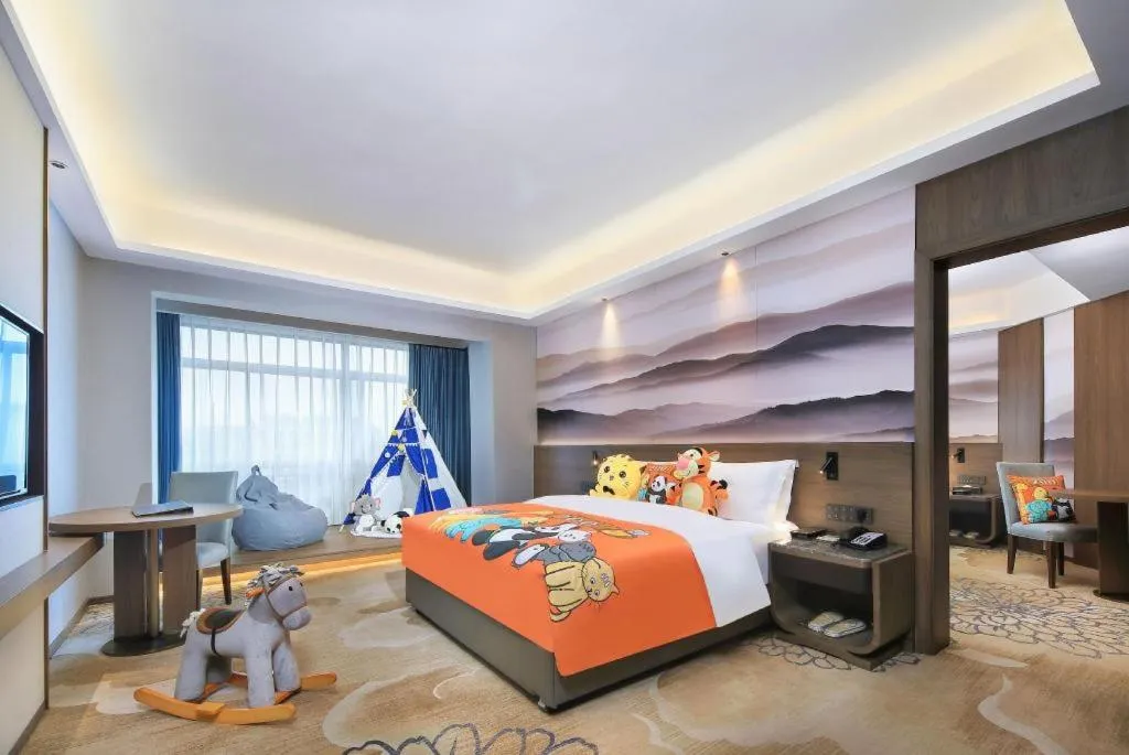 Bed in Vienna Hotel Guangxi Guilin 7-Star Wanda Plaza