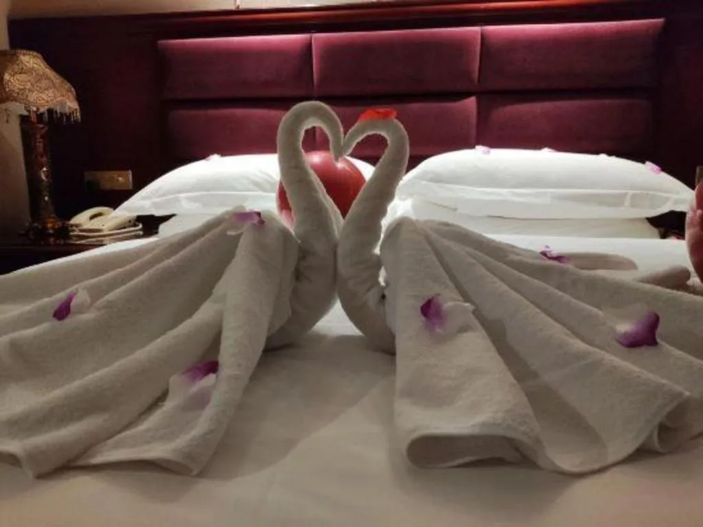 Bed in Vienna Hotel Guangxi Guilin 7-Star Wanda Plaza