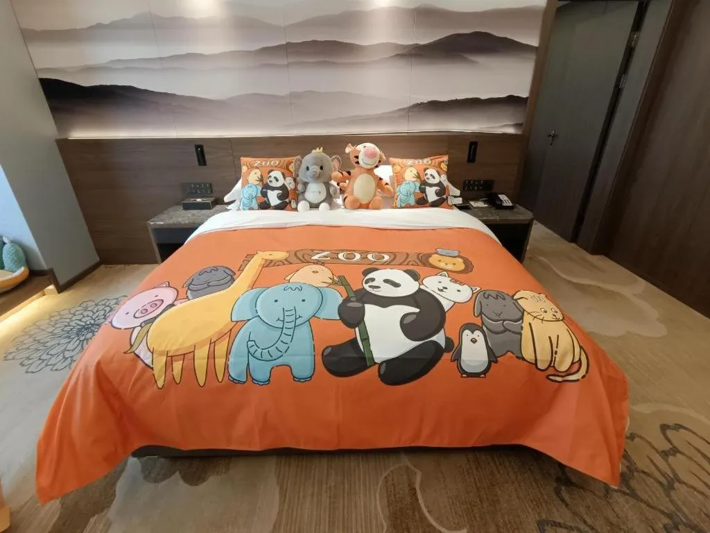 Bed in Vienna Hotel Guangxi Guilin 7-Star Wanda Plaza