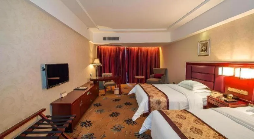 Bed in Vienna Hotel Guangxi Guilin 7-Star Wanda Plaza