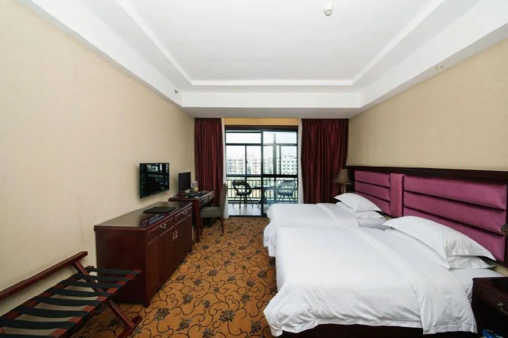 Bed in Vienna Hotel Guangxi Guilin 7-Star Wanda Plaza