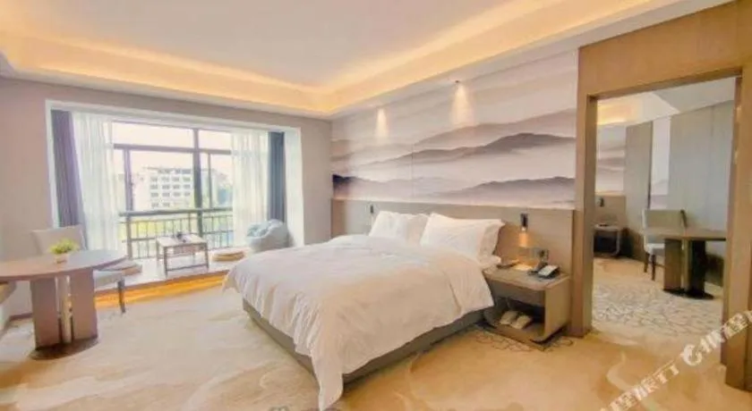 Bed in Vienna Hotel Guangxi Guilin 7-Star Wanda Plaza