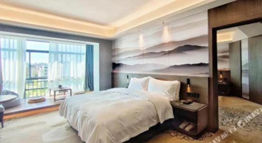 Bed in Vienna Hotel Guangxi Guilin 7-Star Wanda Plaza