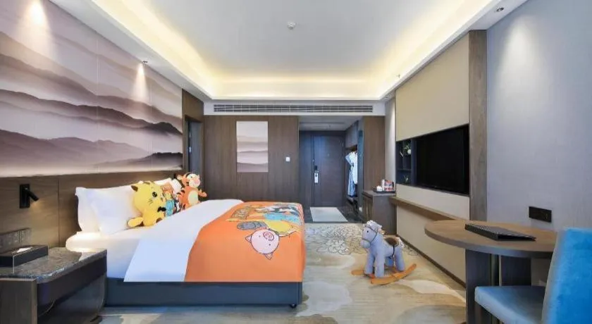 Bed in Vienna Hotel Guangxi Guilin 7-Star Wanda Plaza