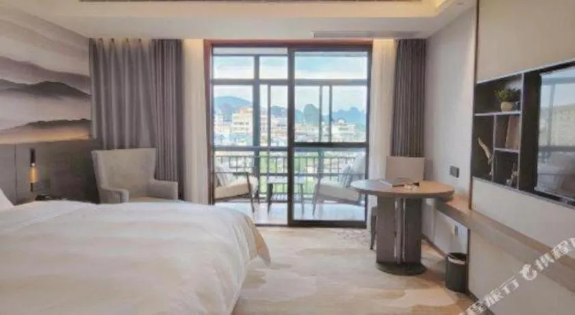 Bed in Vienna Hotel Guangxi Guilin 7-Star Wanda Plaza