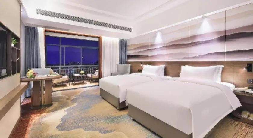 Bed in Vienna Hotel Guangxi Guilin 7-Star Wanda Plaza