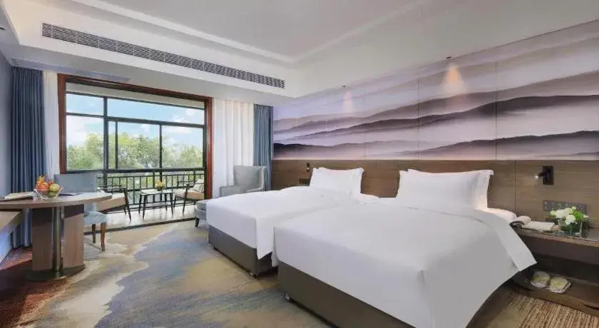 Bed in Vienna Hotel Guangxi Guilin 7-Star Wanda Plaza Bed in Vienna Hotel Guangxi Guilin 7-Star Wanda Plaza