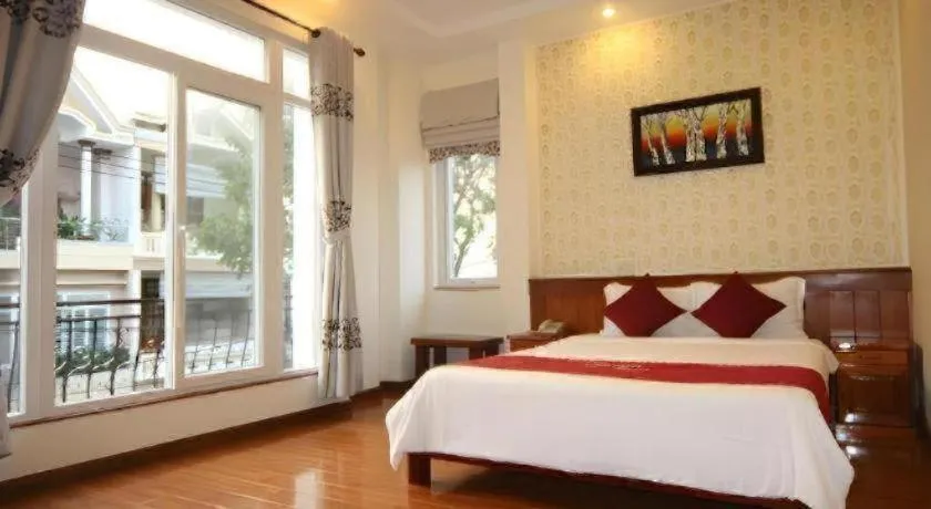 Bed in Omega Da Nang Beach Hotel