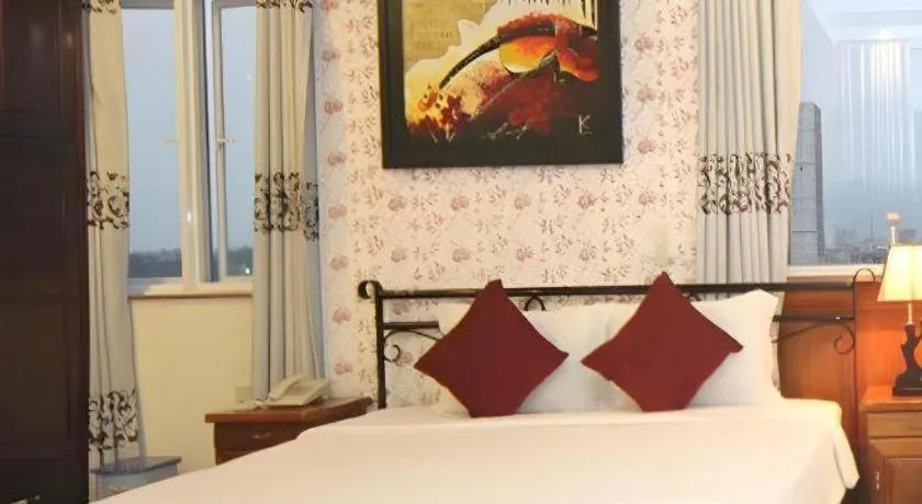 Bed in Omega Da Nang Beach Hotel