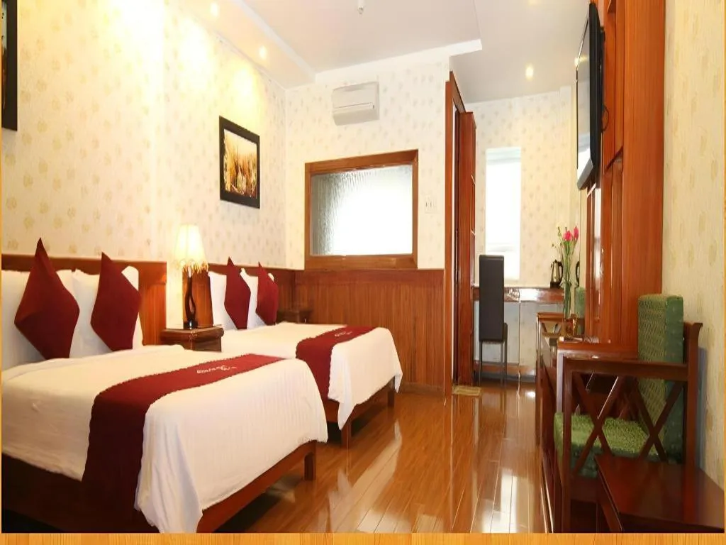 Bed in Omega Da Nang Beach Hotel