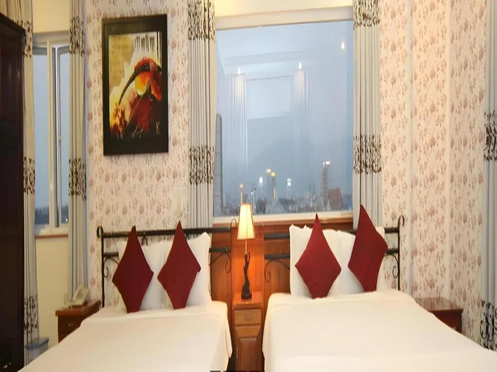 Bed in Omega Da Nang Beach Hotel