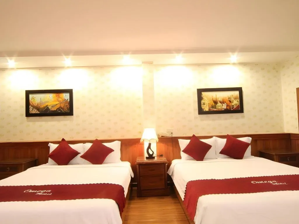 Bed in Omega Da Nang Beach Hotel