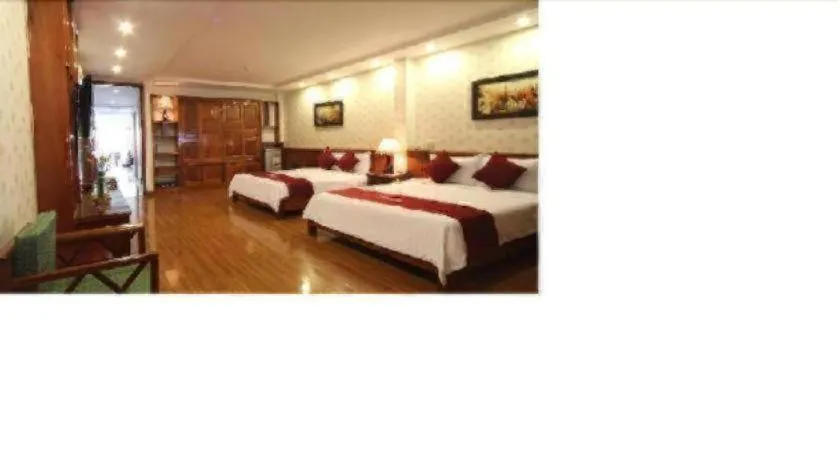 Bed in Omega Da Nang Beach Hotel