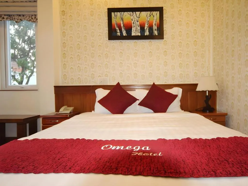 Bed in Omega Da Nang Beach Hotel