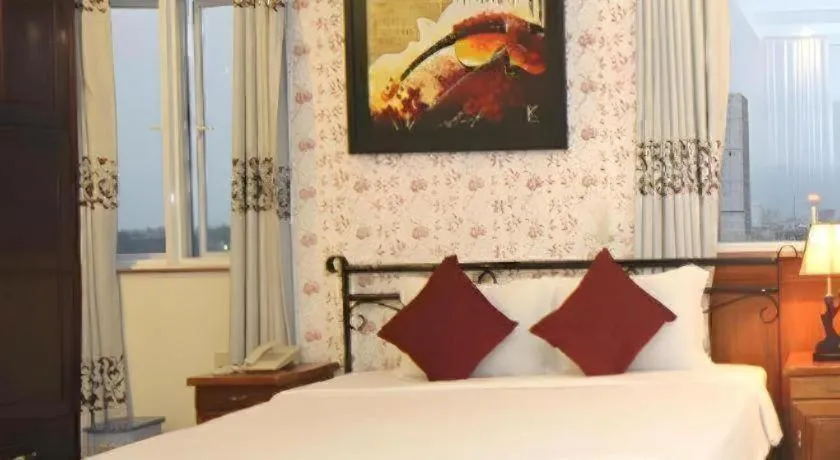 Bed in Omega Da Nang Beach Hotel