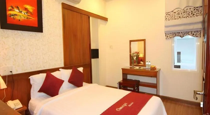 Bed in Omega Da Nang Beach Hotel