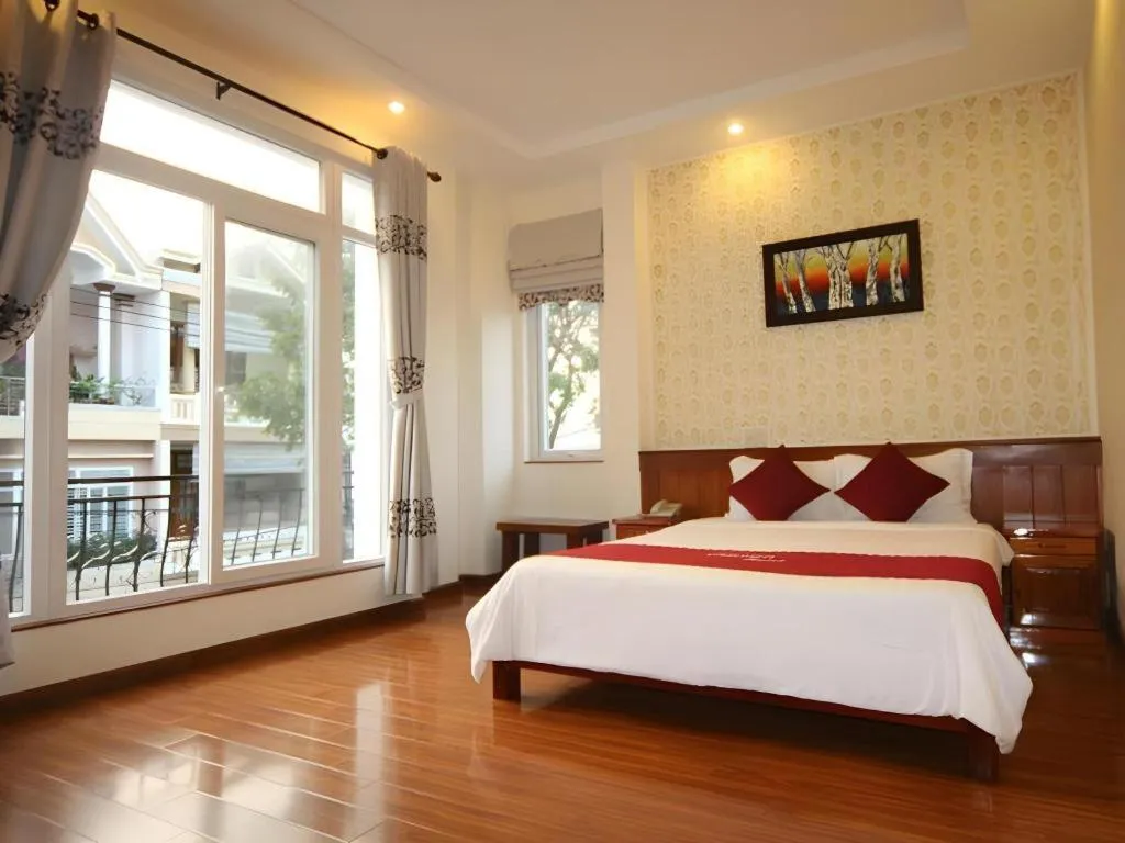 Bed in Omega Da Nang Beach Hotel