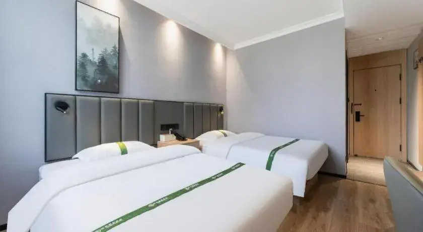 Bed in GreenTree Inn Weihai Port Bed in GreenTree Inn Weihai Port