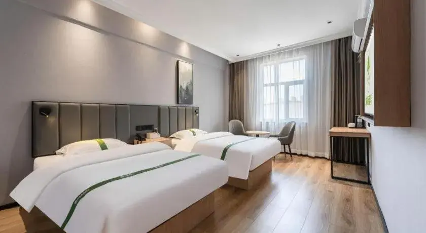 Bed in GreenTree Inn Weihai Port Bed in GreenTree Inn Weihai Port