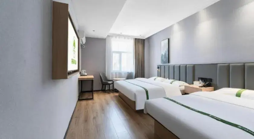 Bed in GreenTree Inn Weihai Port Bed in GreenTree Inn Weihai Port