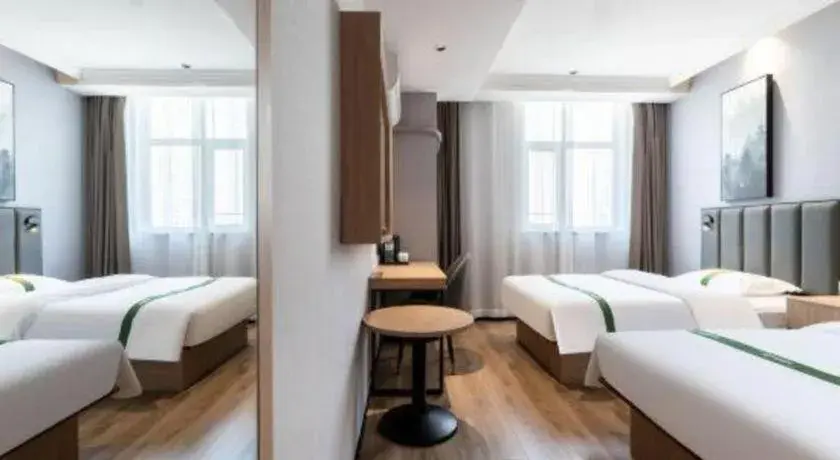 Bed in GreenTree Inn Weihai Port Bed in GreenTree Inn Weihai Port