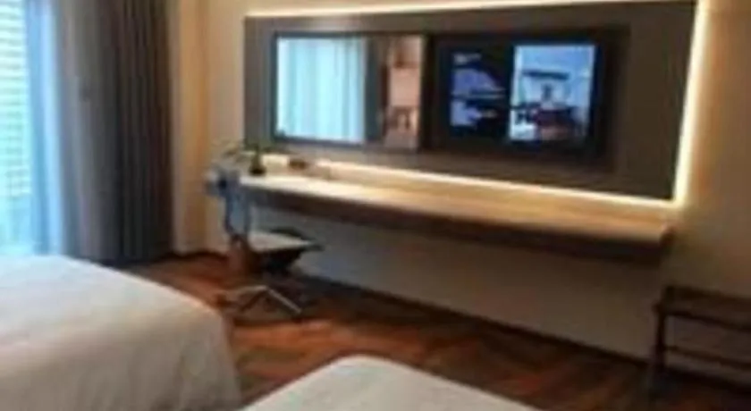 Bed in Wuhan Gleetour Hotel