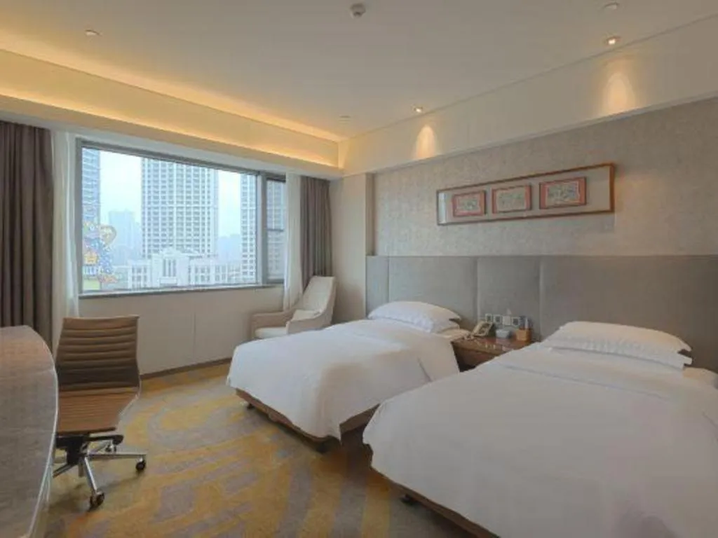 Bed in Wuhan Gleetour Hotel