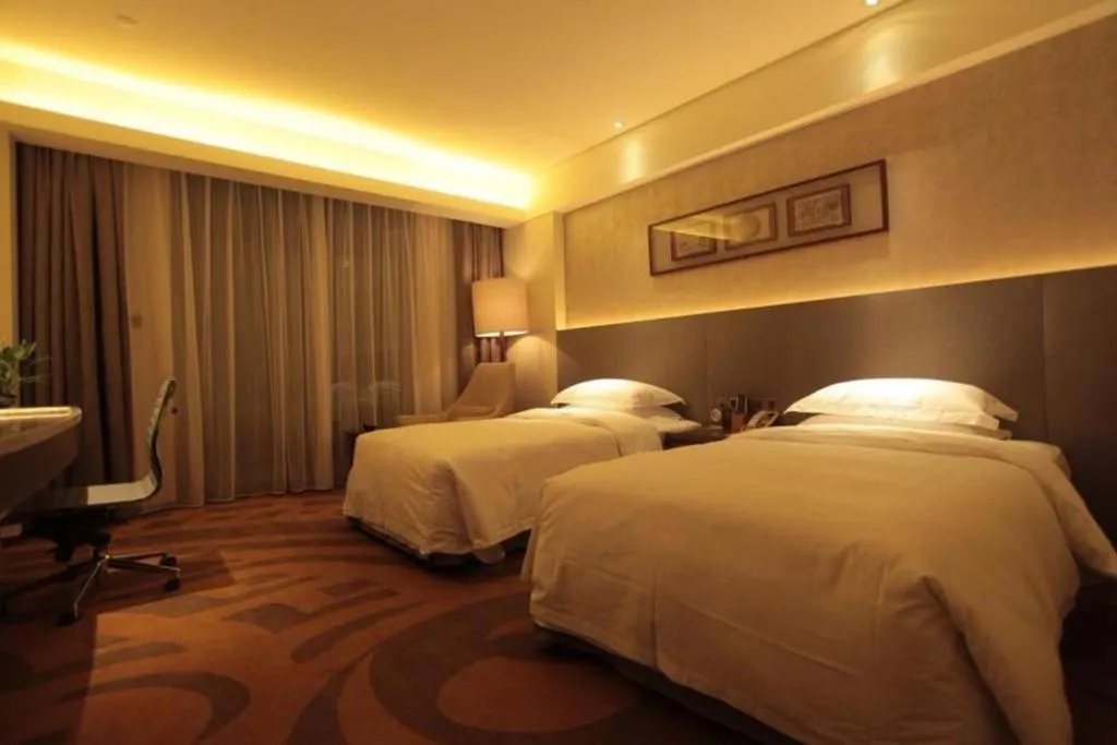 Bed in Wuhan Gleetour Hotel
