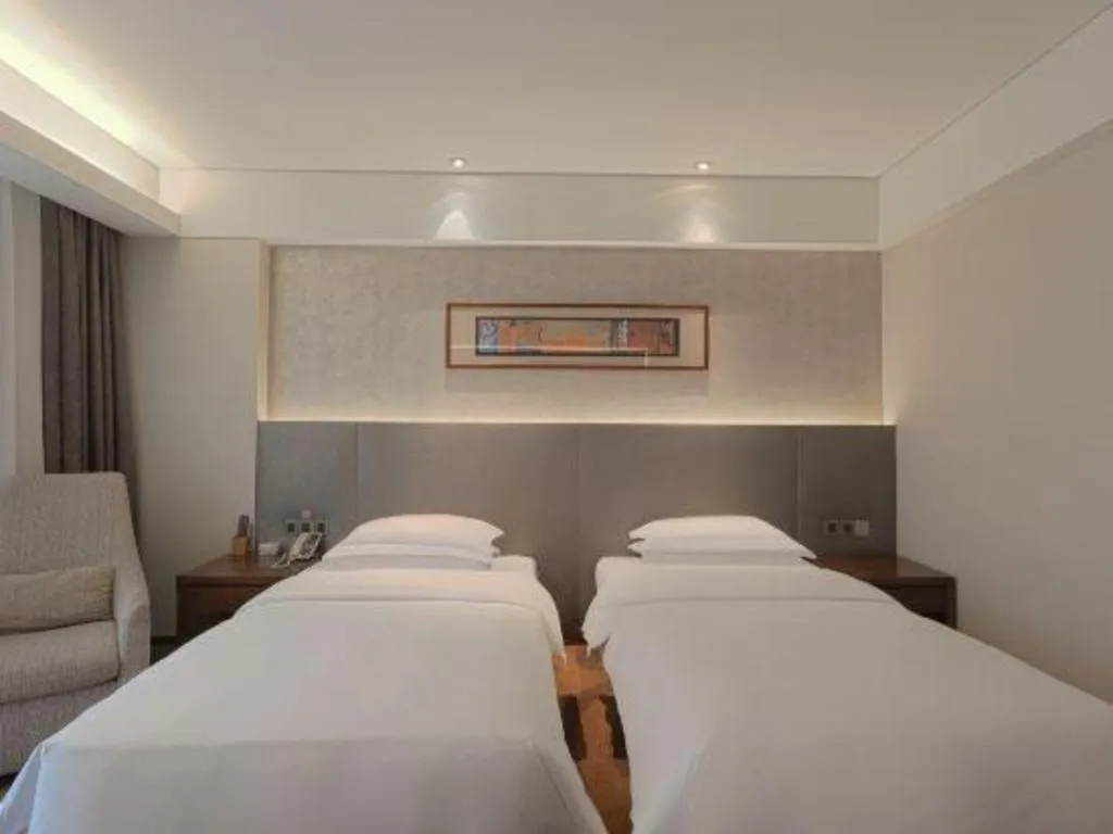 Bed in Wuhan Gleetour Hotel