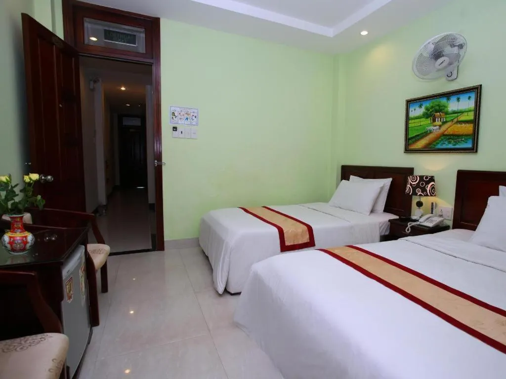 Bed in Souvenir Nha Trang Hotel