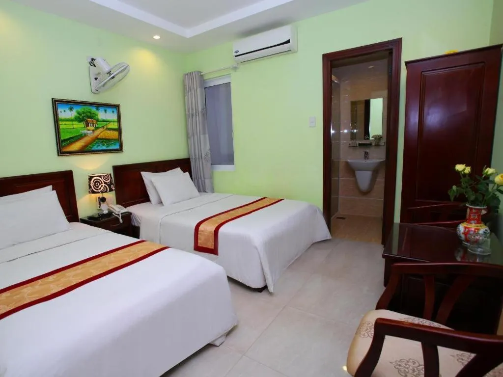 Bed in Souvenir Nha Trang Hotel