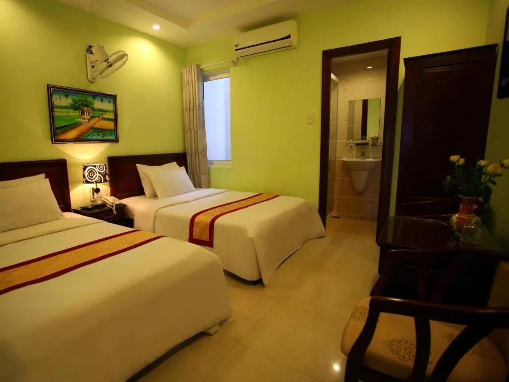 Bed in Souvenir Nha Trang Hotel