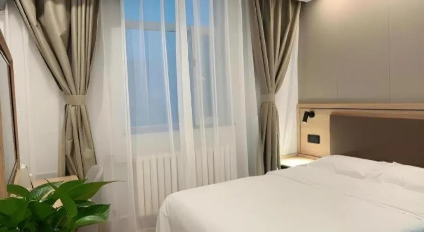 Bed in GreenTree Inn Beijing Fengtai Dongda Street Express Hotel
