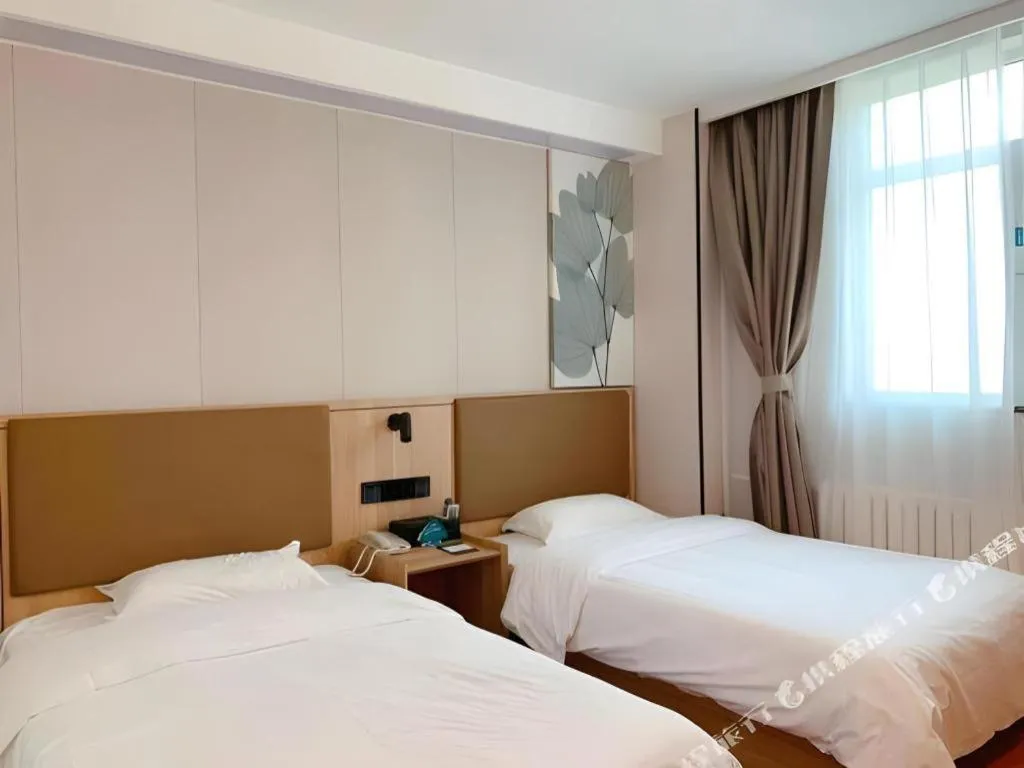 Bed in GreenTree Inn Beijing Fengtai Dongda Street Express Hotel