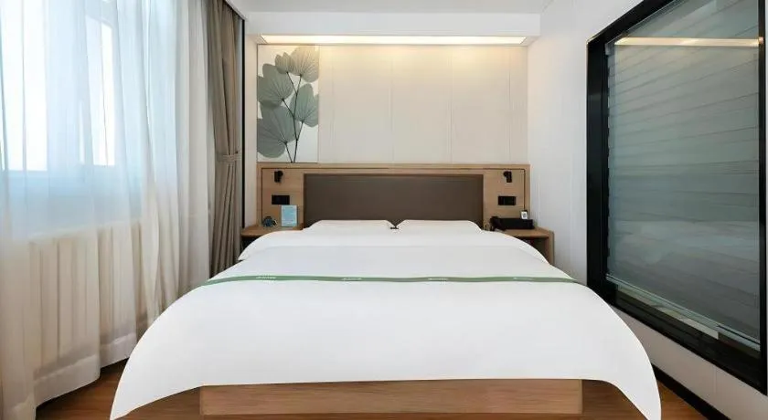 Bed in GreenTree Inn Beijing Fengtai Dongda Street Express Hotel