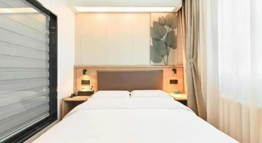 Bed in GreenTree Inn Beijing Fengtai Dongda Street Express Hotel