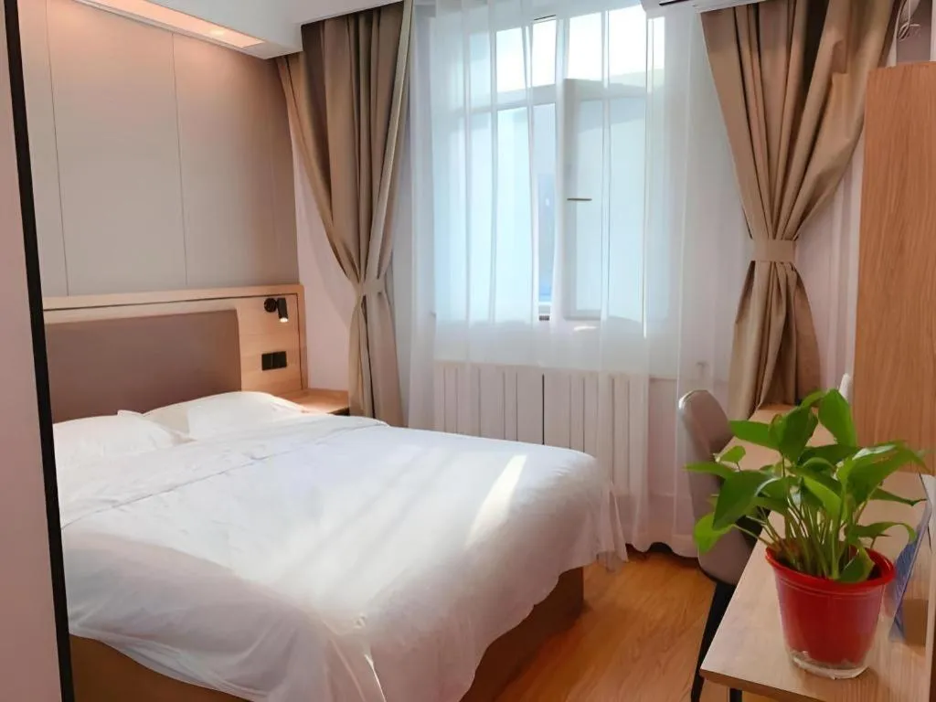 Bed in GreenTree Inn Beijing Fengtai Dongda Street Express Hotel